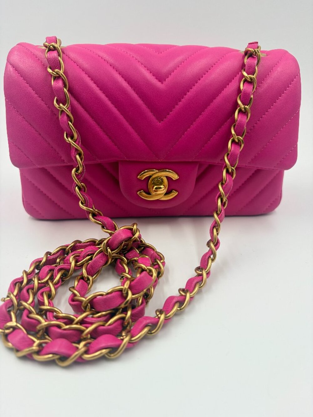 Authentic CHANEL Lambskin Chevron Mini Rectangular Pink with gold hardware